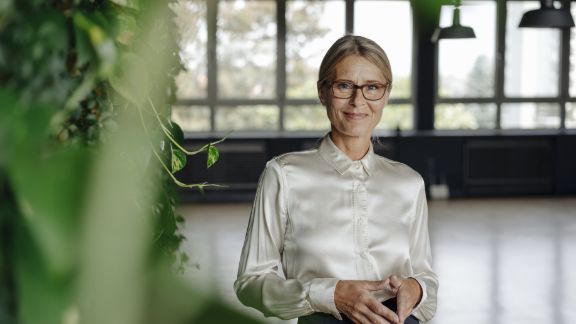 Kvinde_smiler_text-image-50_50_576x324